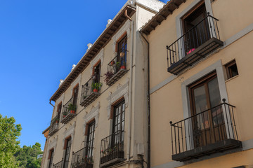 Fototapeta na wymiar Beautiful facades of two old buildings, in Granada, Spain