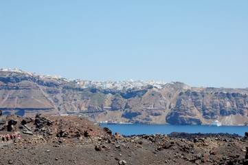 Coast of Santorini volcano, Greece. Caldera. Lifeless emissions of basalt, a reminder of the...