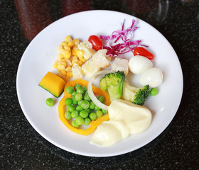 healthy foods are on the table, Fresh vegetable salad in a white plate