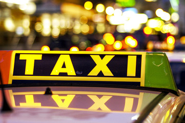 Taxi stand in Vienna, luminous taxi sign