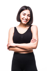 Athletic girl crossing her hands on a white background