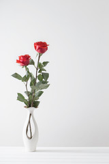 bouquet of red roses in vase