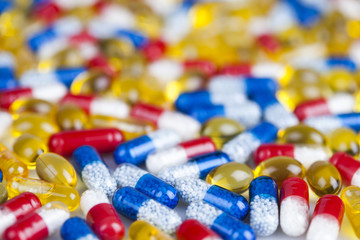 Closeup of medical capsule, healthy background