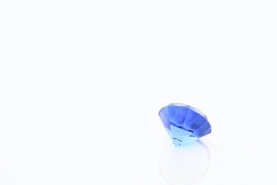 Big Blue Diamond Made of Glass with White Backdrop