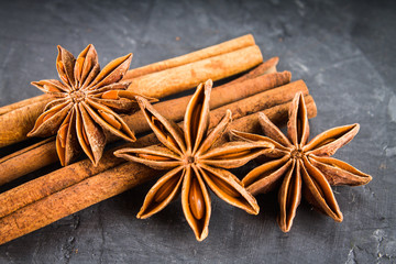 star anise and cinnamon on the gray background