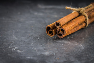 star anise and cinnamon on the gray background
