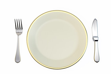 Plate and knife and fork on a white background