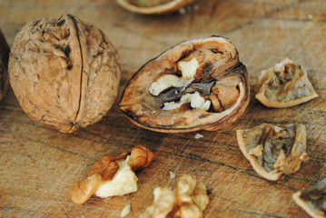 Fototapeta premium nuts on a wooden surface