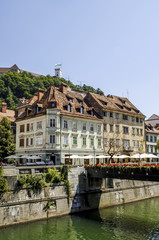 Fototapeta na wymiar Ljubljana, view from river Ljubljanica to castle on hill, Sloven