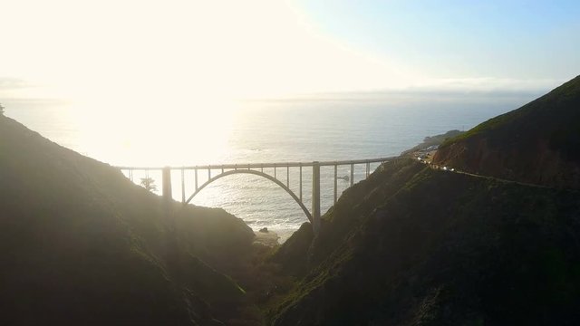 Aerial view of Bixby Bridge and Pacific Coast Highway California, USA. Zoom in