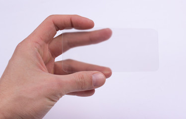 transparent glass phone in hand