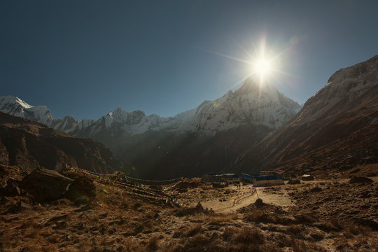 Sunrise above Machapuchare mountain with view on Annapurna Base Camp in Himalaya mountains, Nepal