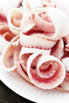 Stroganina is a shavings of raw frozen fish. It is a dish of the indigenous people of northern Siberia and Polar circle. 