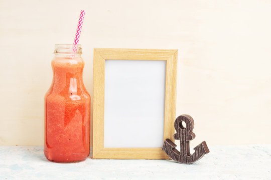 Mock up with Red drink, photo frame and anckor