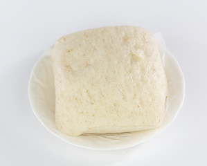 steamed bread on white plate