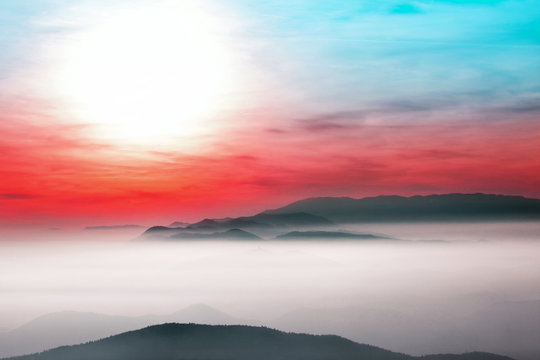 Beautiful landscape view with colorful cloudscape and sun.