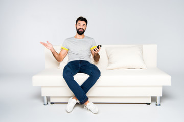 Bearded man using smartphone