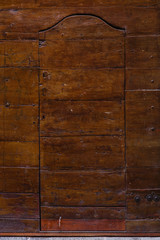 Ancient Italian wooden Door. Typical form, vintage tone, texture for background