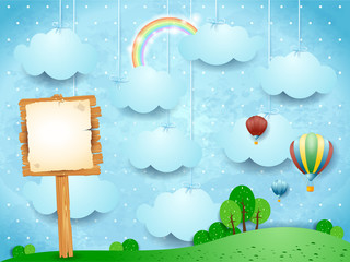 Surreal landscape with hot air balloons and wooden sign