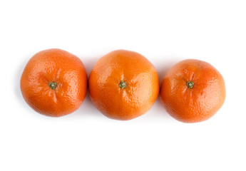 Ripe mandarin close-up on a white background. Tangerine orange. Colorful Food and drink still life concept. Fresh fruits and vegetables on color background. Clementine. Citrus. Fresh fruits. Diet.