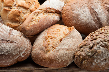 Bread arranged on wooden table