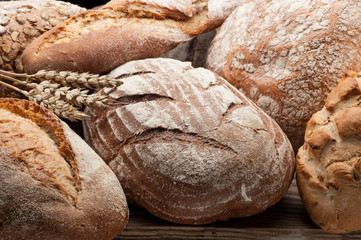 Bread arranged on wooden table
