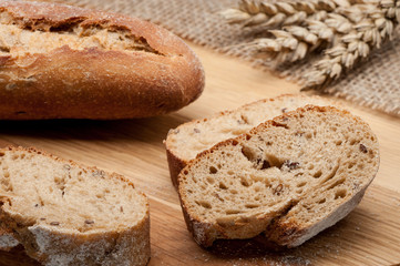 sliced baguette bread on wooden table