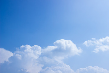 White fluffy clouds in the blue sky