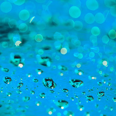 abstract blue background with water drops, shallow depth of field