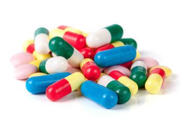 colorful pills isolated on white background