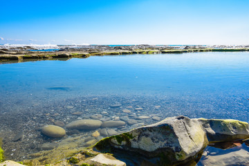 Fototapeta na wymiar Beautiful landscape, seascape, amazing nature background with rocks and blue water.