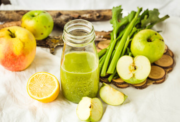 green detox juice with apple, kale, lemon and celery