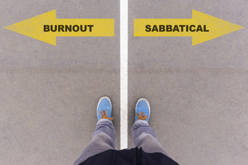 Burnout or sabbatical text on asphalt ground, feet and shoes on floor - obrazy, fototapety, plakaty