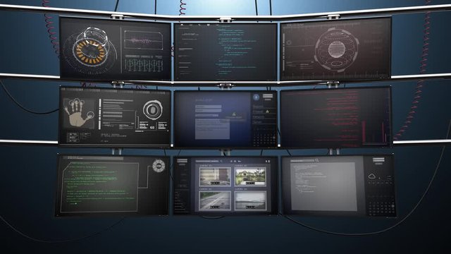 Nine Video Screen Monitors Animate with Data and Surveillance. A variety of video monitor screens on a wall display various data and surveillance images 
