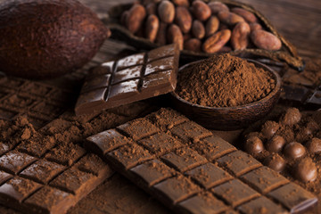 Bars Chocolate , candy sweet, dessert food on wooden background