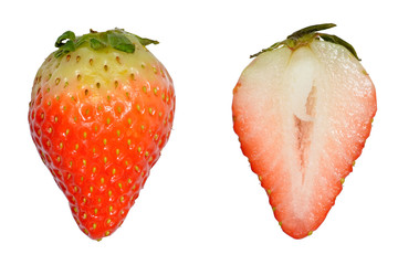 Strawberry cut in half isolated on a white background.