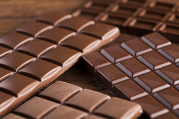 Bars Chocolate , candy sweet, dessert food on wooden background