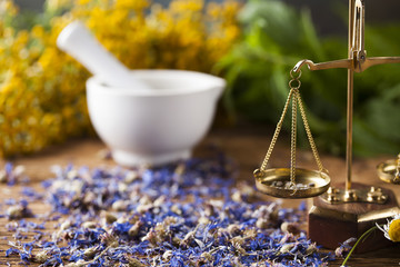 Herbal medicine on wooden desk background