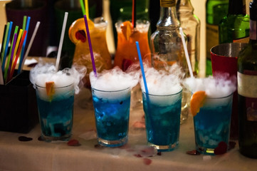 Barman show. Bartender is preparing alcoholic fuming cocktails.