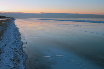 Gulf of Riga in winter evening. Jurmala, Latvia