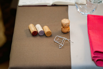 few wine cork on table with napkin background