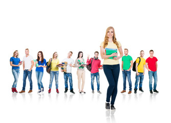 Obraz premium Large group of teenage students isolated on white background. Many different people standing together. School, education, college, university concept.