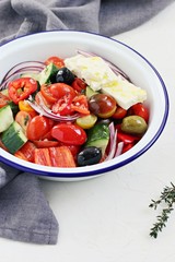Vegetable salad with olives and feta cheese.Traditional Greek cuisine.Selective focus