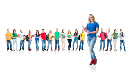 Obraz premium Large group of teenage students isolated on white background. Many different people standing together. School, education, college, university concept.