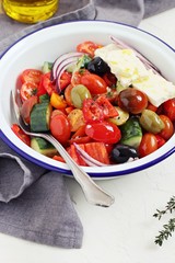 Vegetable salad with olives and feta cheese.Traditional Greek cuisine.Selective focus