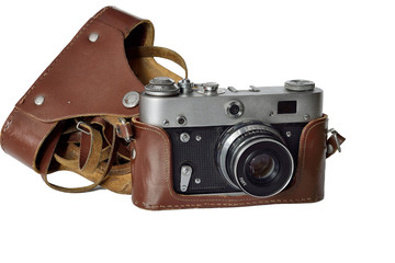 Vintage old film photocamera in leather case