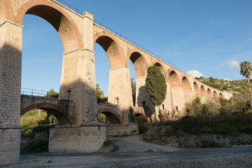 Fototapeta na wymiar The arches of the bridge