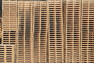 wooden pallets on stock in factory backyard