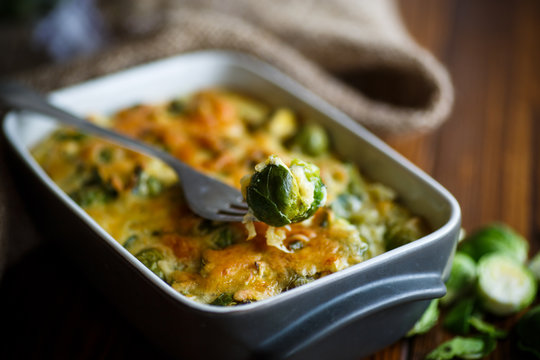 Brussels sprouts baked in sauce with cheese