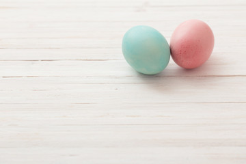 Easter eggs on a wooden background